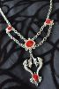 Chain necklace with swags.  Red accents and two dragons