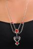 Chain necklace with swags.  Red accents and two dragons